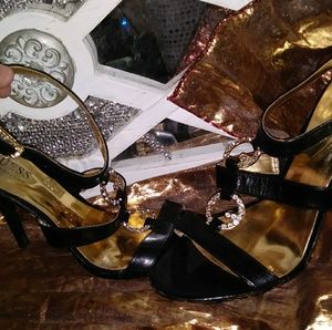 Black Leather amd rhinestone heels.